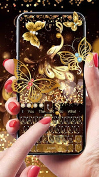 Image 1 for Gold Glitter Butterfly Ke…