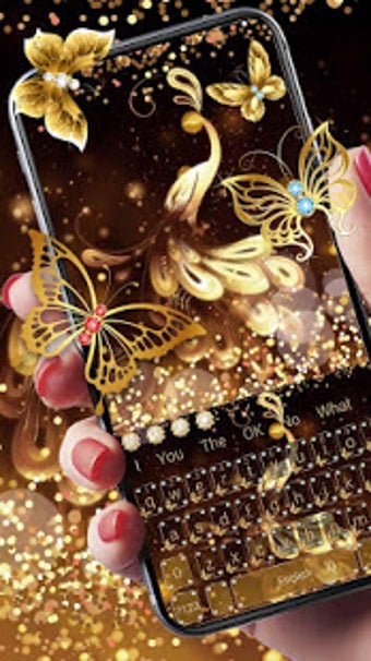 Image 0 for Gold Glitter Butterfly Ke…
