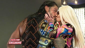 Image 0 for Roman Reigns kiss Lana al…